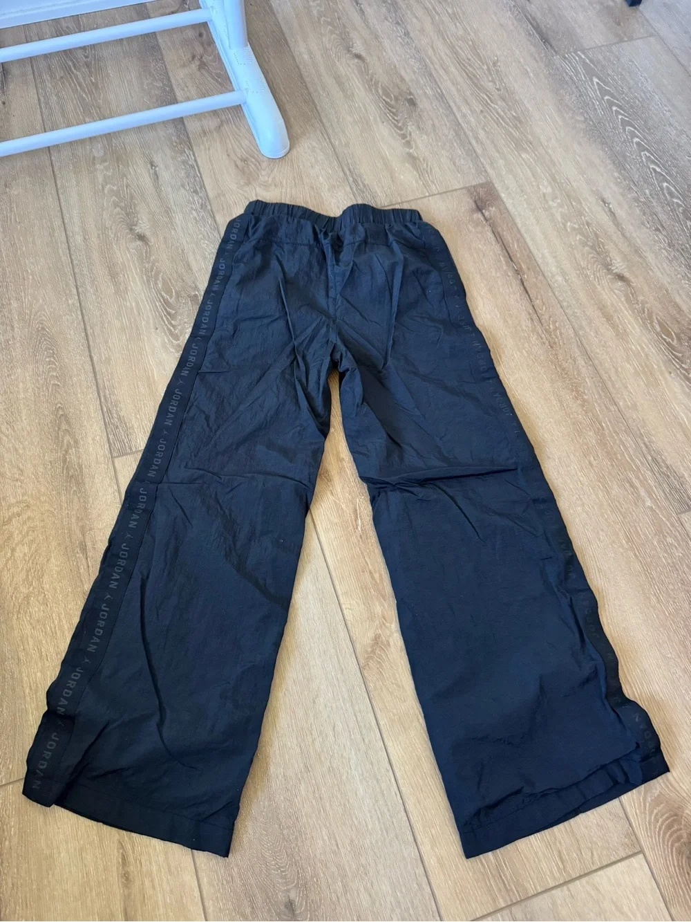 Black Jordan track pants wide-leg silhouette logo taping Youth Medium